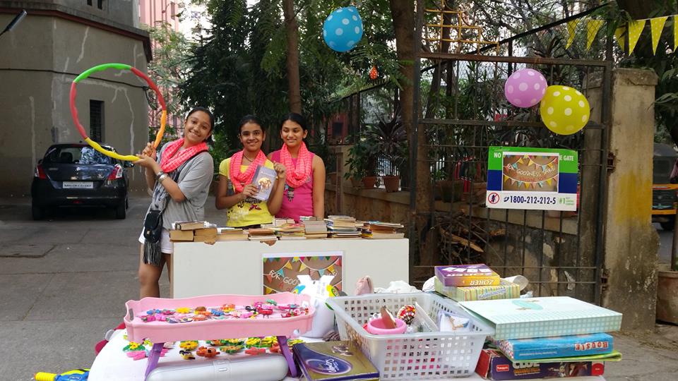 her second garage sale.. her best friends volunteer to help