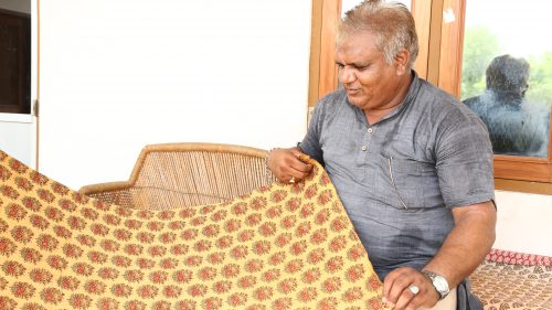 Lalchandji with his most prized possession, a print that won him a National award