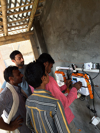 Anoop along with villagers at a water ATM