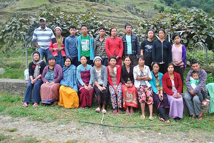 Puneet with a group of farmers in Dirang, Arunachal Pradesh after a week of kiwi fruit harvesting and packing. Image courtesy: Crop-Connect