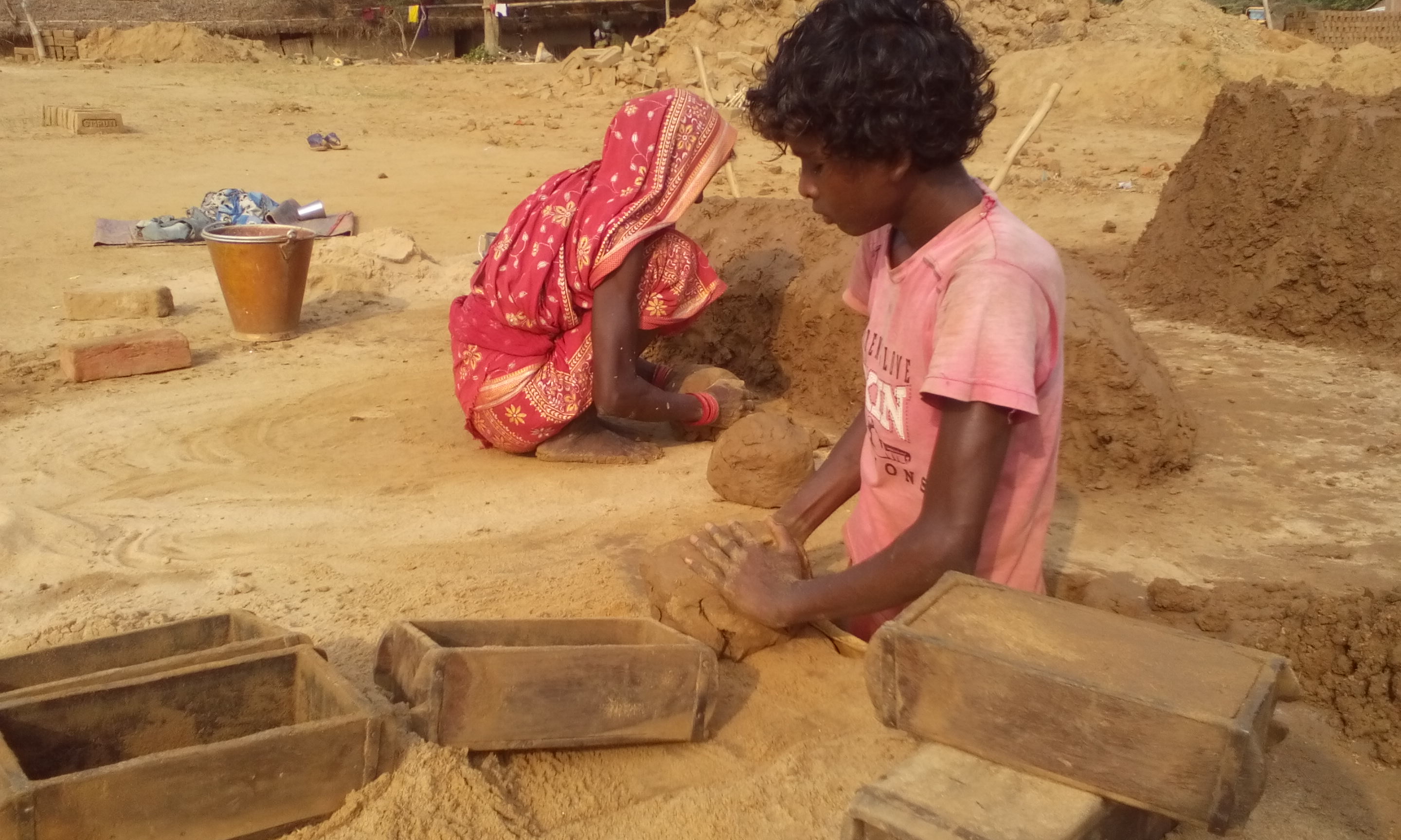 A child labourer at a brick kiln