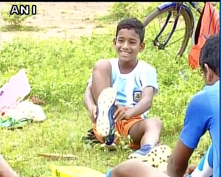 Chandan tying shoes