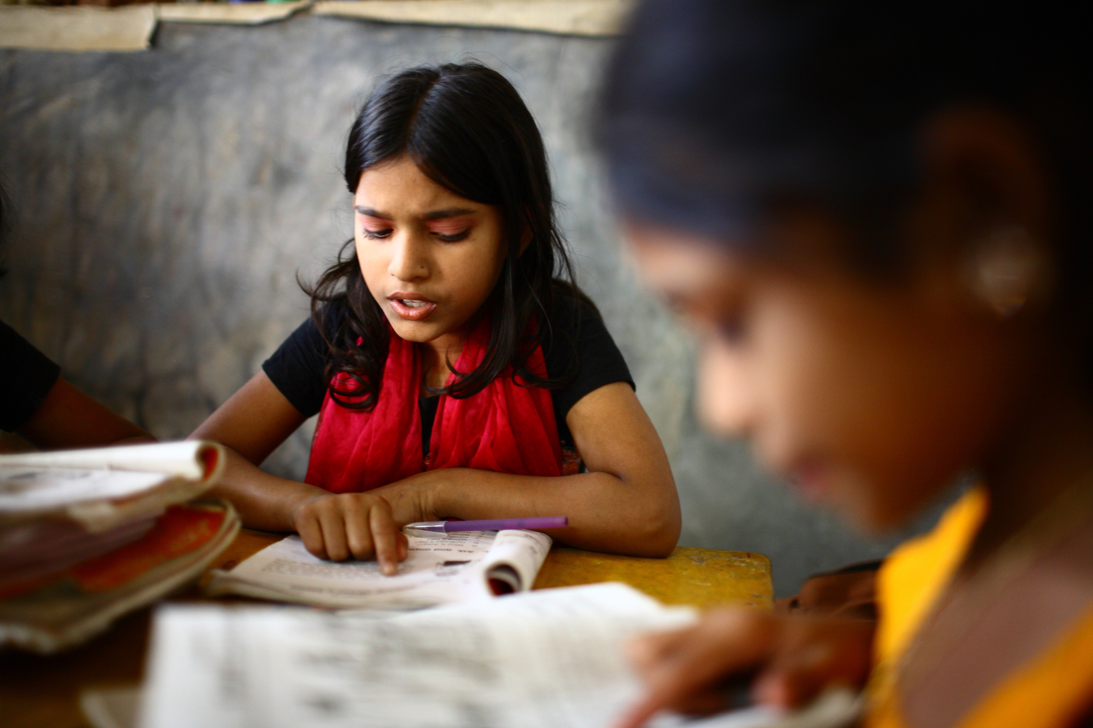 10 years old Dipa and 12 years old Laboni study in class two at Studying at UNIQUE CHILD LEARNING CENTRE. Mirpur