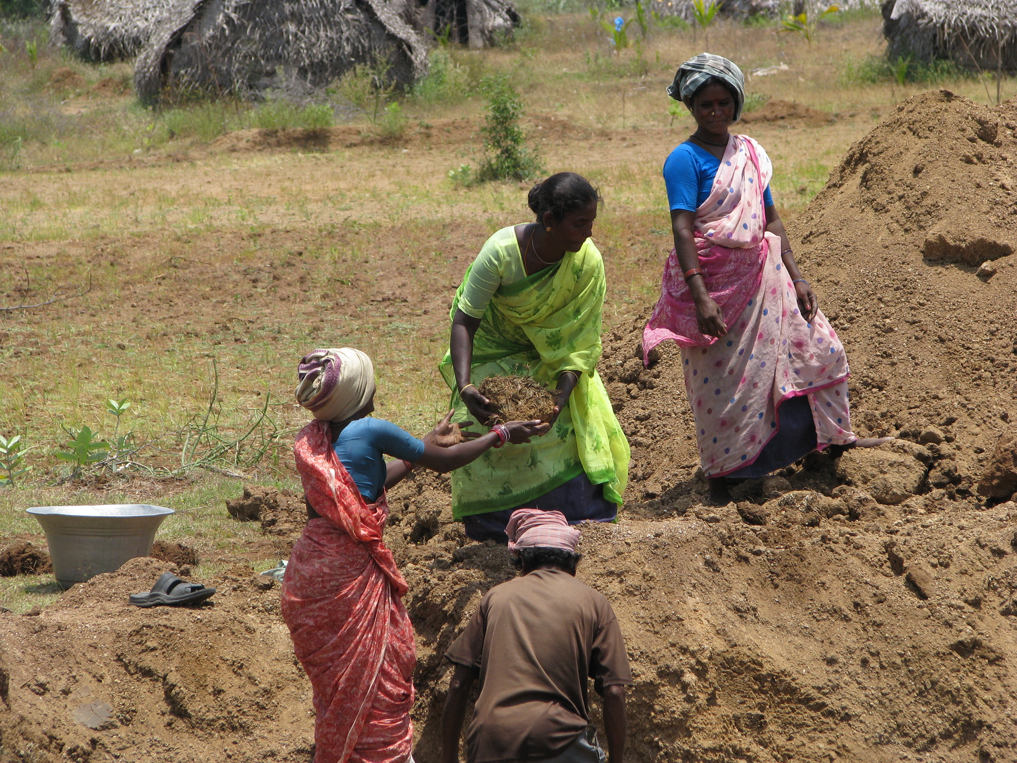 villagers_building_a_water_storage_pond_1_2507498679