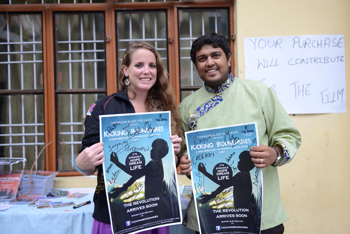 Director Irshal Ishu and football coach Cassie Childers pose for a photo in McLeod Ganj, India, on 6 October 2013.