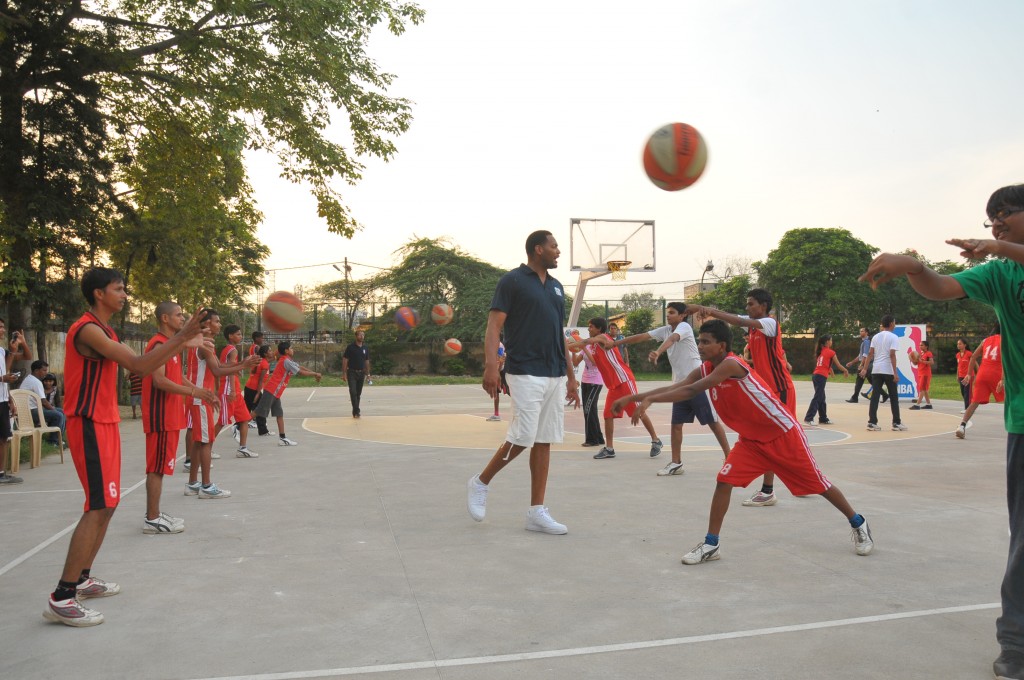 Indian kids playing basketball