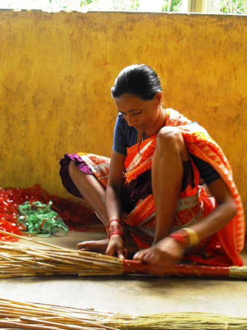Tribal women in Kashipur have been making brooms to run their homes for generations. (Credit: Abhijit Mohanty\WFS)