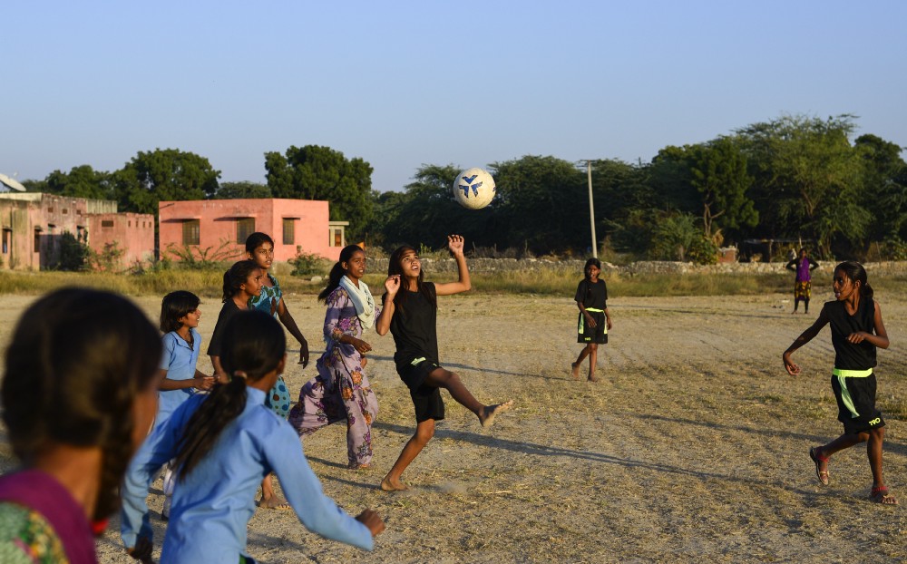 Smita juggle the ball during practice, in Sakariya.