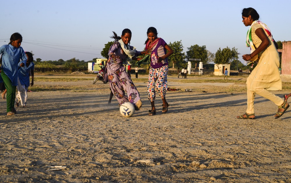 15 — year — old Bhagwati kicks the ball during evening practice, in Sakariya.