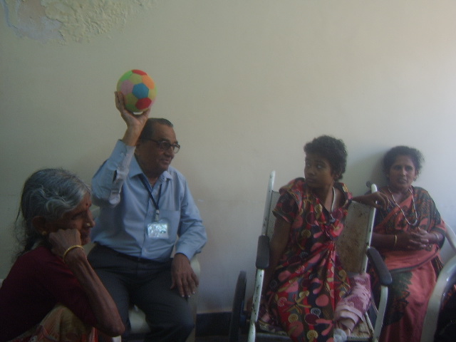 Ramaswamy lifts the spirits of patient and family in a hospital