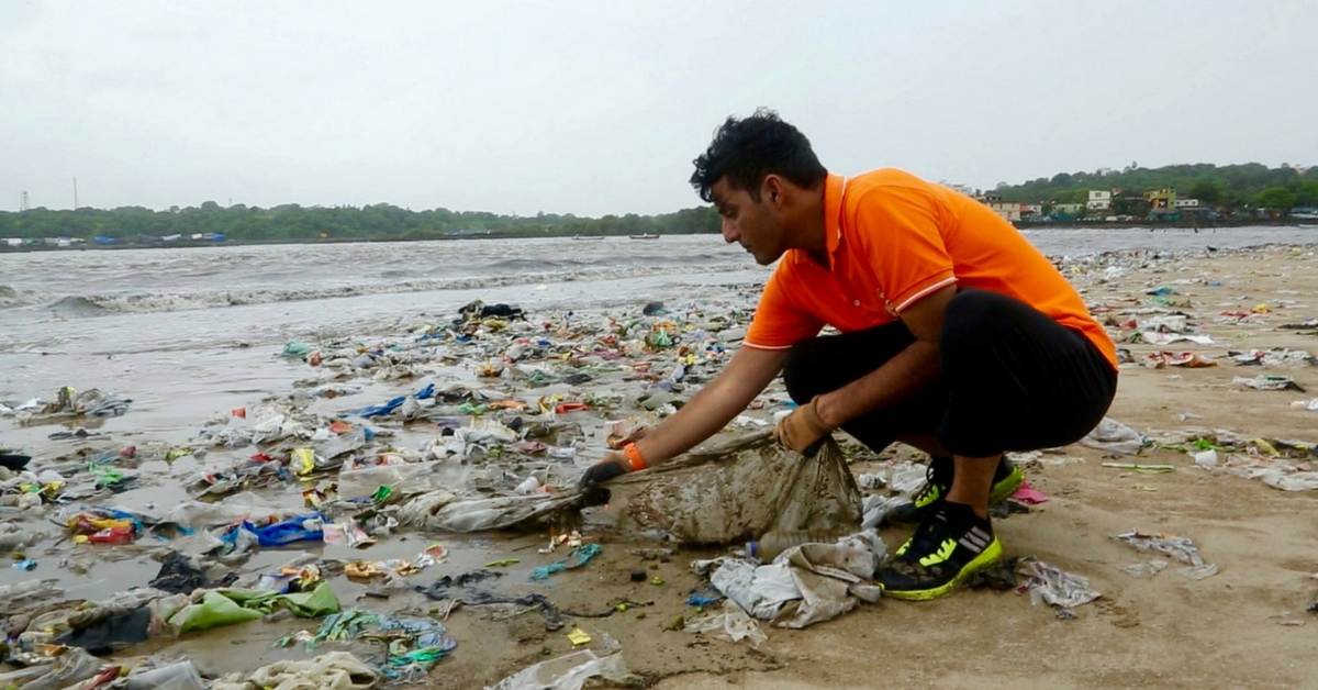 Afroz Shah, collecting litter on the beach. Picture Courtesy: Facebook.