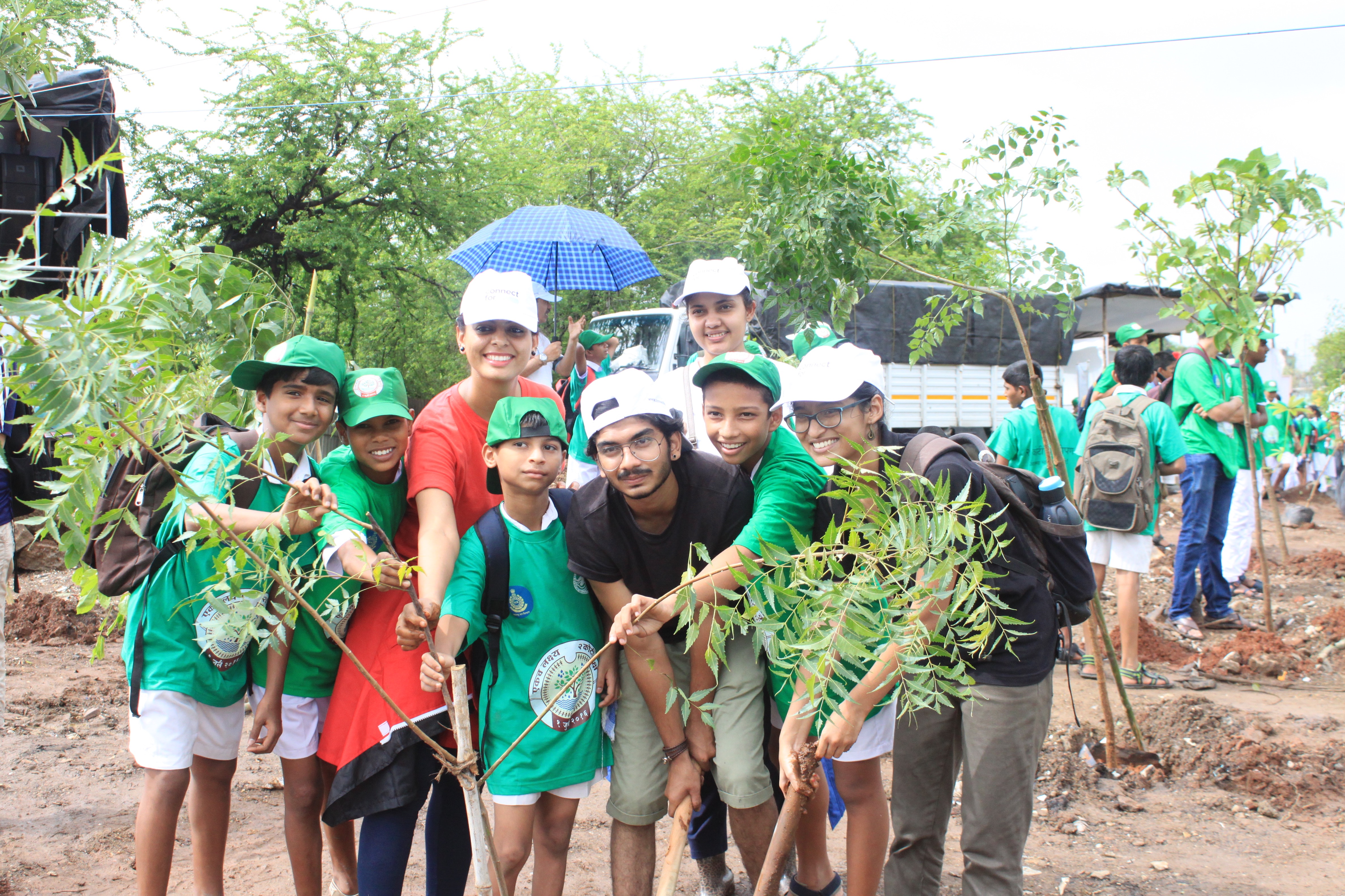 Little humans, from a local school, partnered with our team to plant their own tree