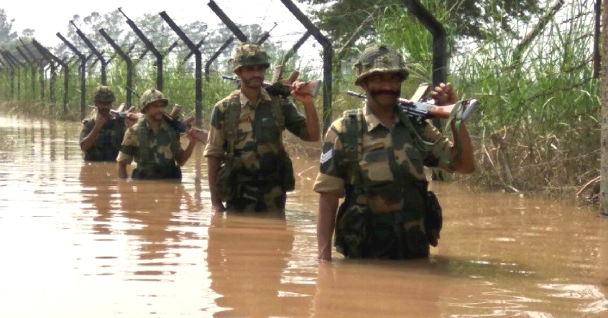 In Pictures: BSF Jawans Brave Floods, Guard Border in Waist-Deep Water in North Bengal