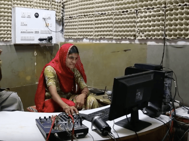 woman editing radio program at Barefoot College