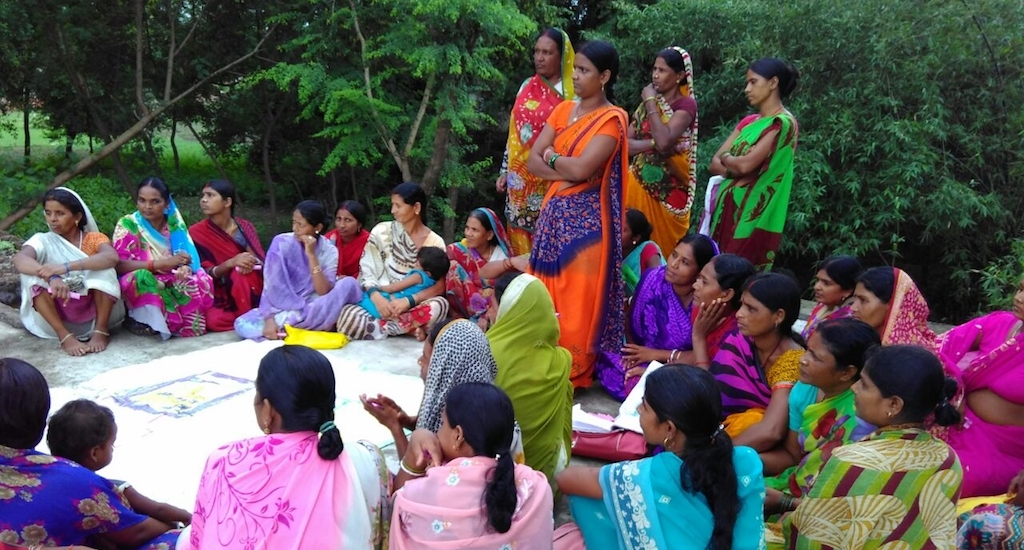 A woman’s meeting in Jehanabad discussing the benefits of building toilets in homes. (Photo by Mohd Imran Khan)
