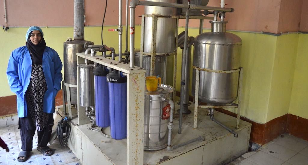 Towseefa Rizwi at her honey processing plant in Shalhar-Bandipora. (Photo by Athar Parvaiz)