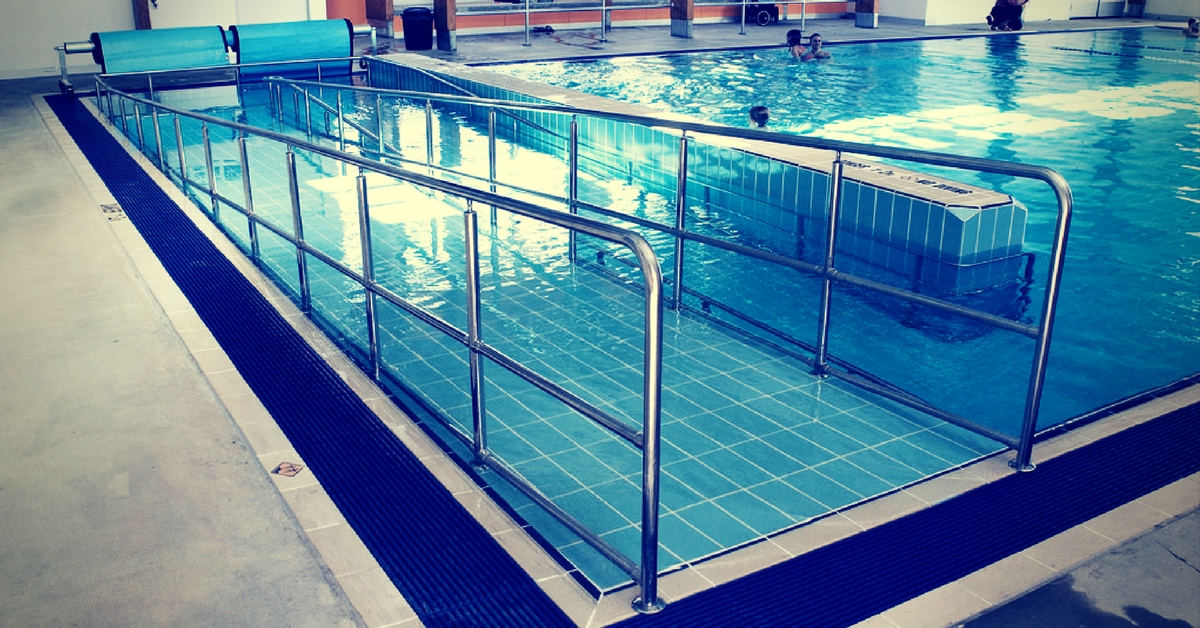 A pool with a ramp for the differently-abled. Image Courtesy: Flickr.