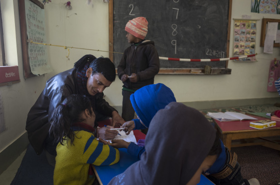 Govind Da, a CLass 1 teacher, with students. (Source: Chirag School)