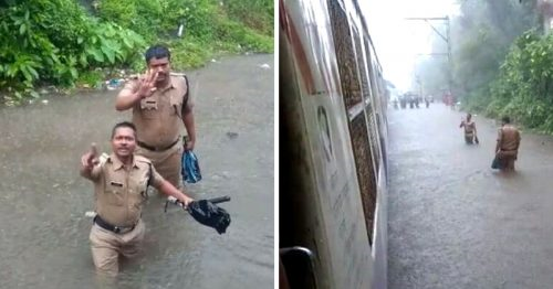 Mumbai police working during the torrential rains. (Source: Twitter- Vishal Surywanshi)