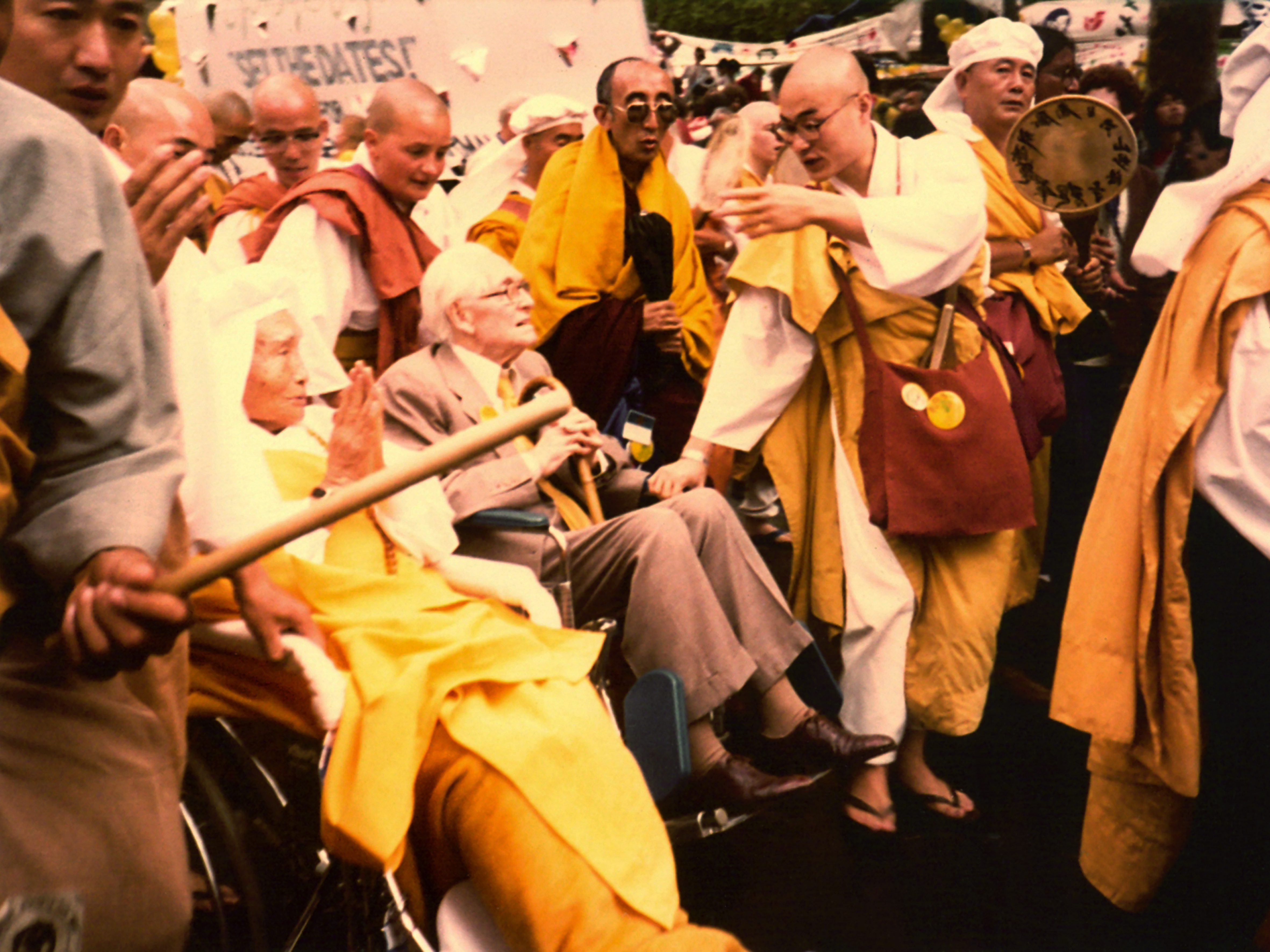 Most Ven Nichidatsu Fujii Guruji (on the wheelchair with folded hands), Lord Philip Noel Barker and Ven Bakula Rinpoche (in dark glasses) at a march on Central Park in New York in 1982 during the United Nations special session on disarmament. (Source: Sonam Wangchuk) 