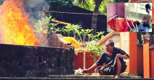 Unexpected Help Rescues Brothers Struggling to Cremate Their Mother
