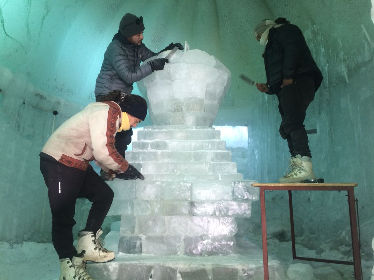 The three artists working on the Ice Chorten (Source: Tsering Gurmet)