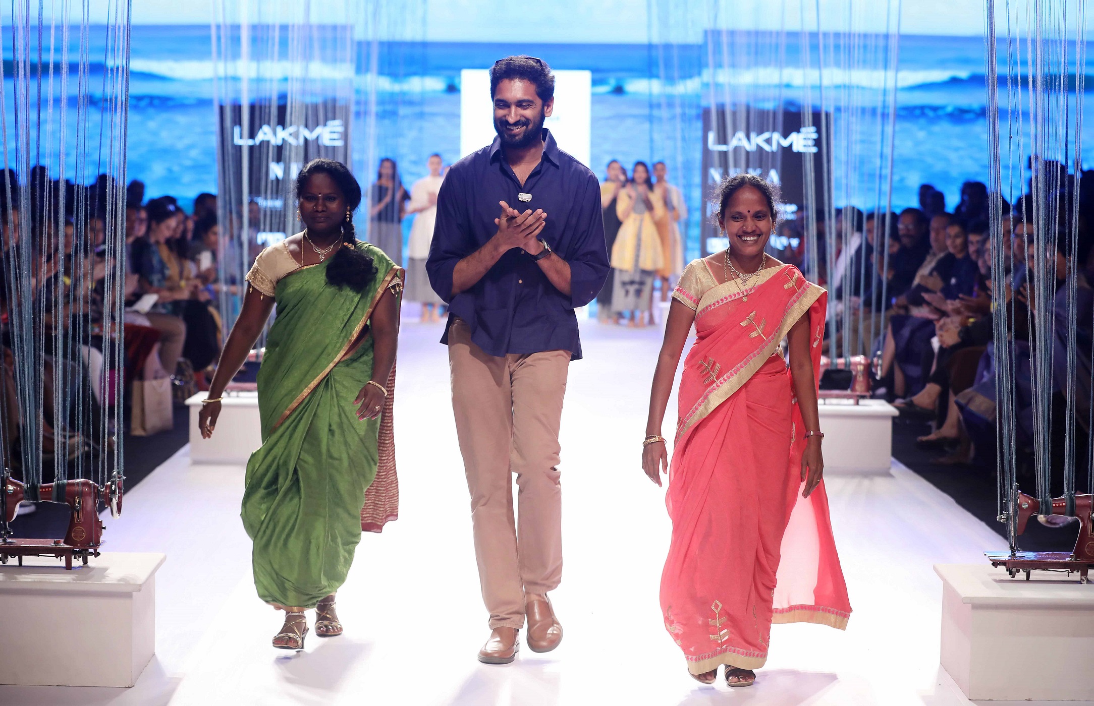 Two rural women from the Usha Silai centres on the ramp at Lakme Fashion Week. (Source: Usha International)