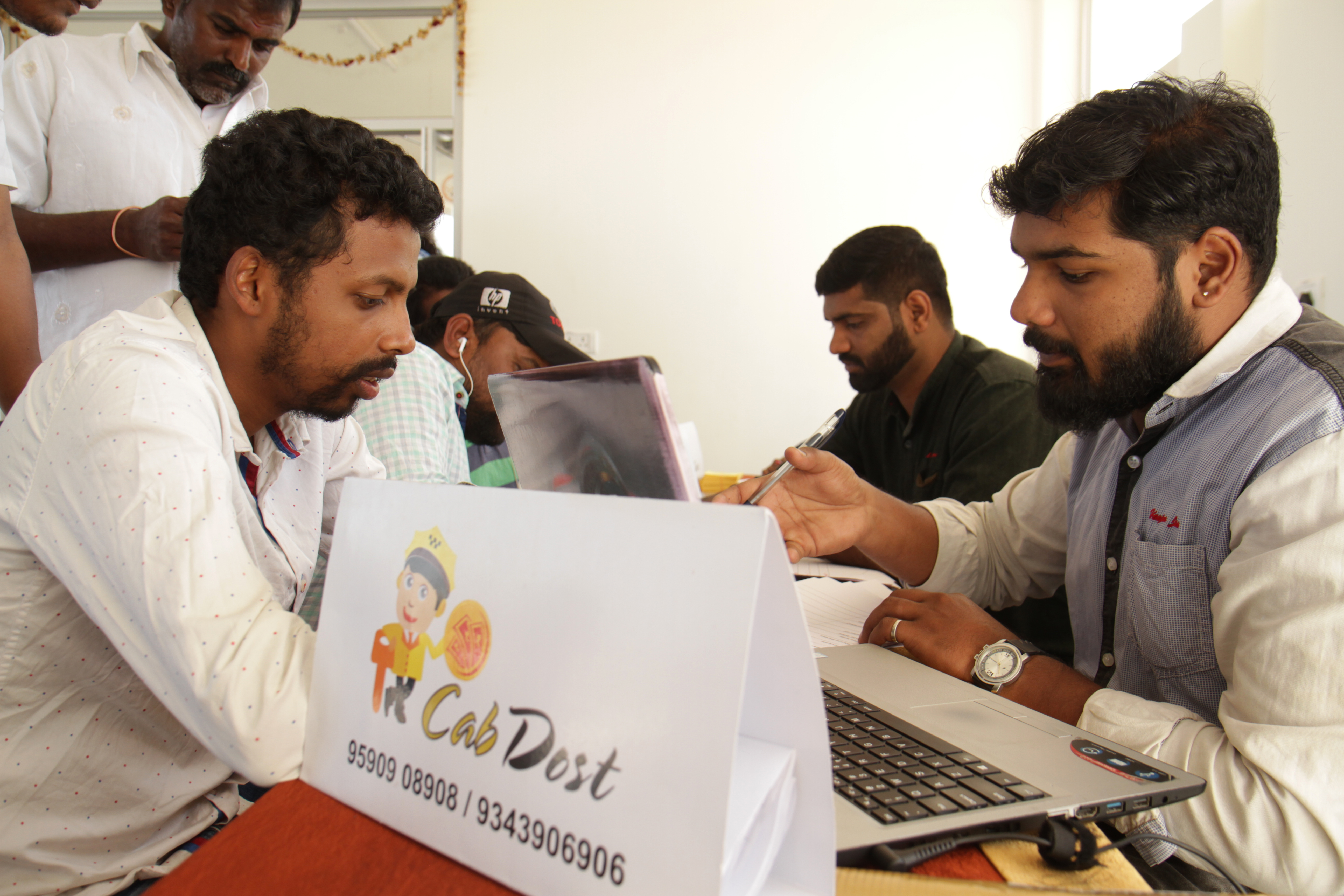 A cab driver getting regsitered at a financial inclusion drive on the Bangalore International Airport Limited (BIAL) premises. 