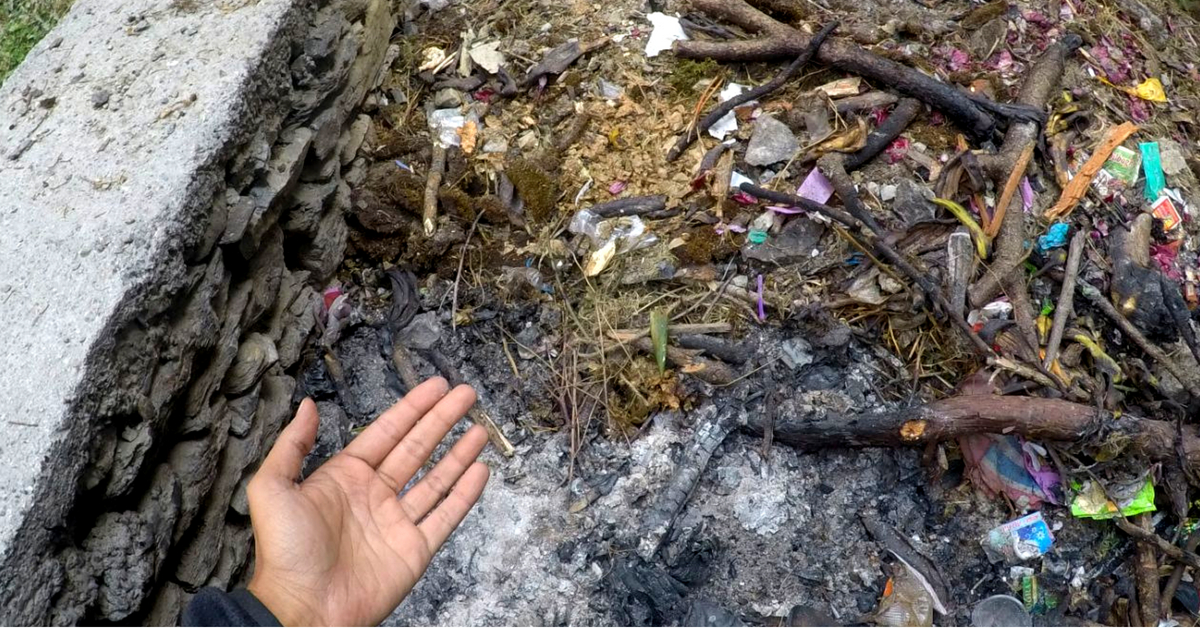 Emptying the pit, and segregating the waste was important, and the hikers got involved with the local population to do so. Image Credit: India Hikes