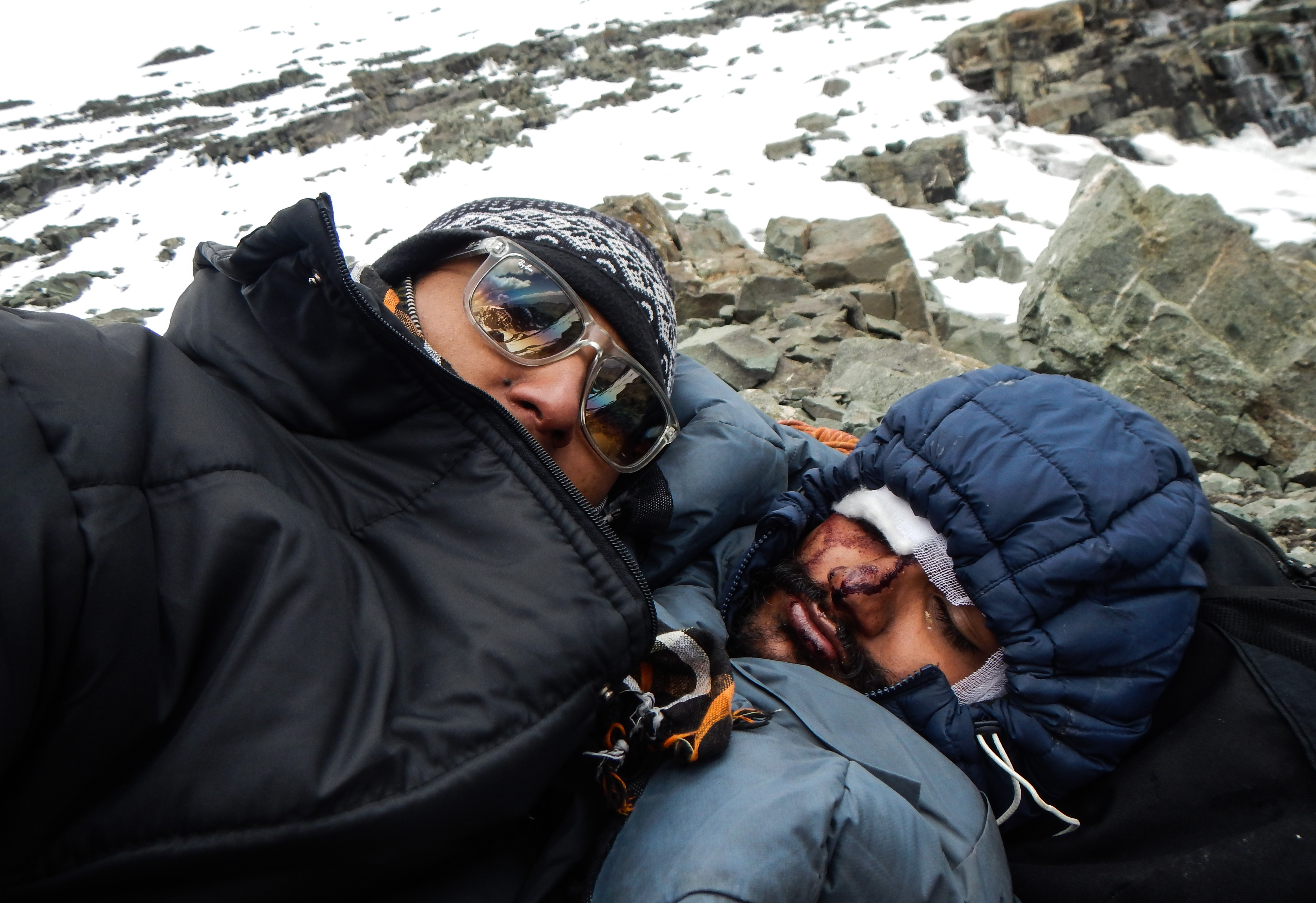 Bidhan (Left) with an injured Udesh while they were waiting for the rescue team. (Source: Bidhan Shrestha)