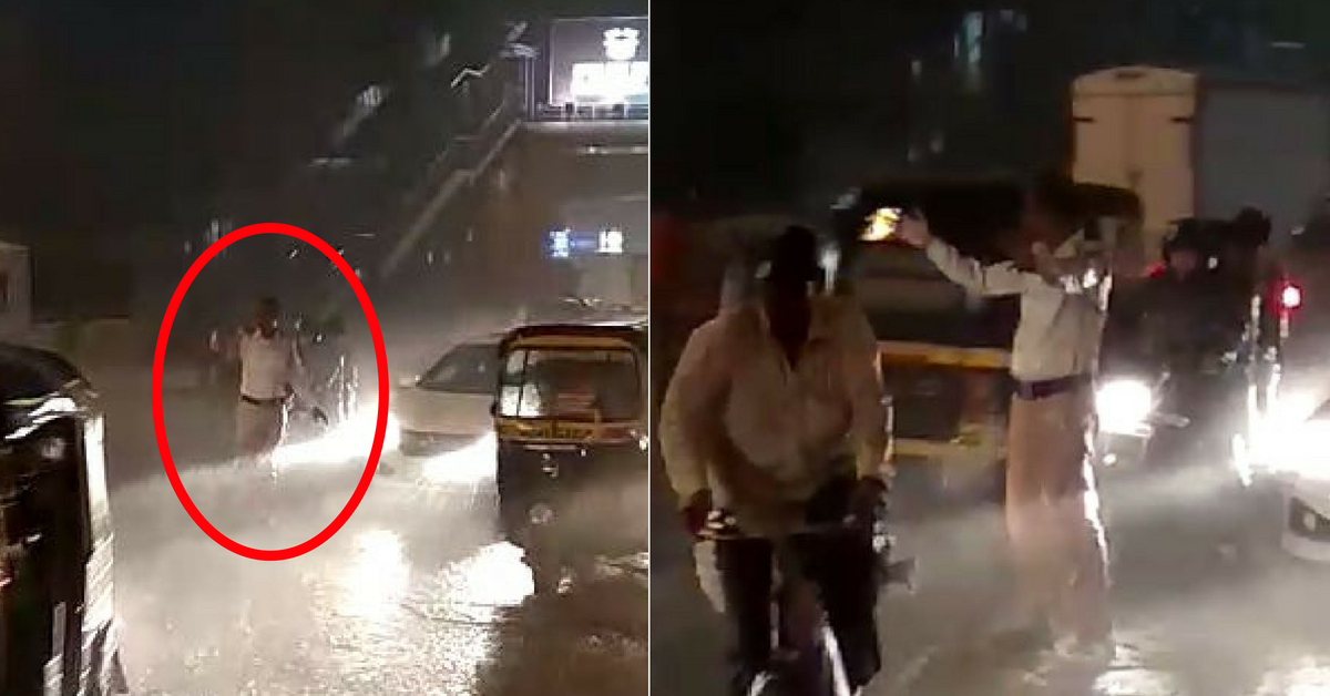 Undaunted by Heavy Rains, Mumbai Cop Controls Traffic Without Raincoat, Umbrella
