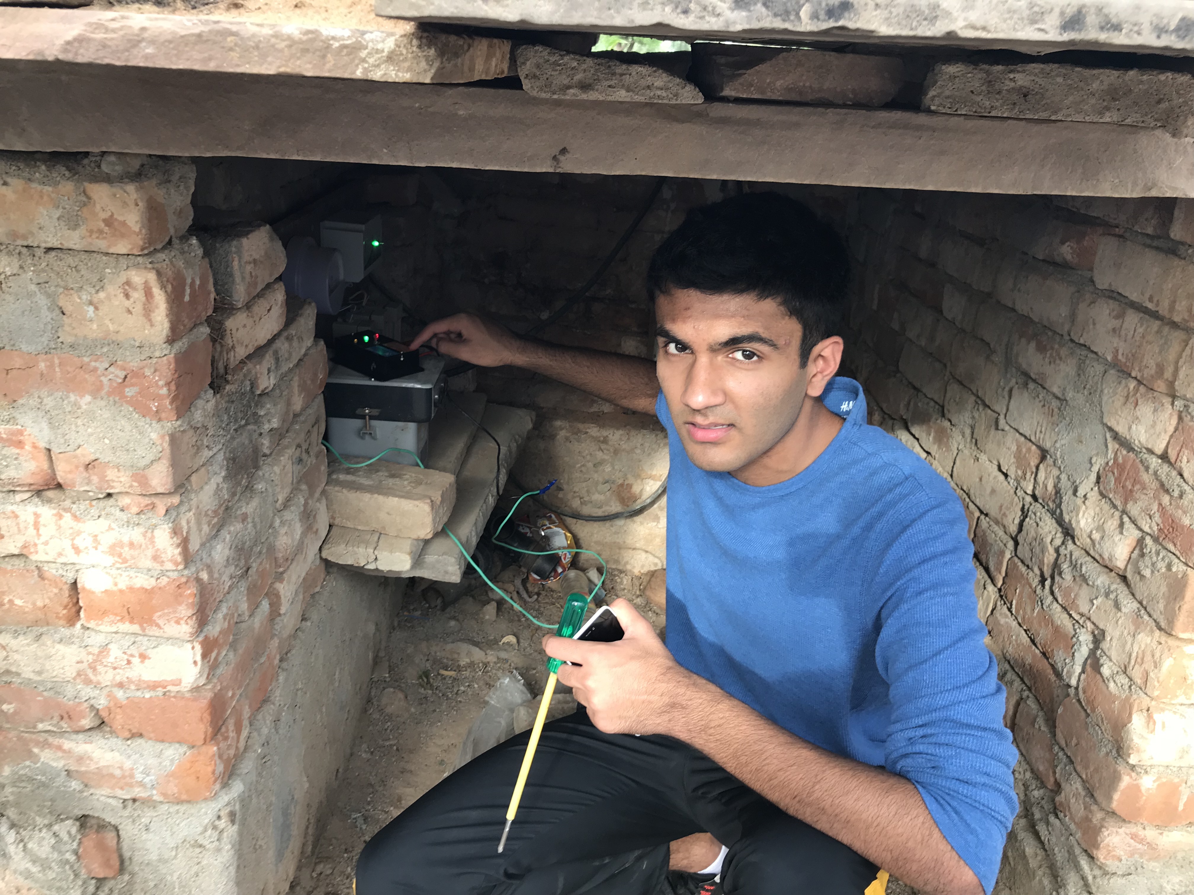 Ishan Malhotra installing the Pluto device. (Source: Ishan Malhotra)