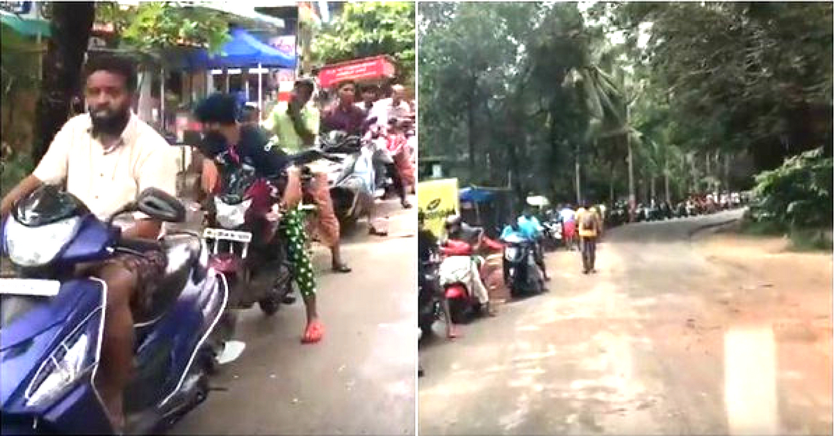 Long line of locals waiting to fill their petrol tank. (Source: Still from the Video Below)