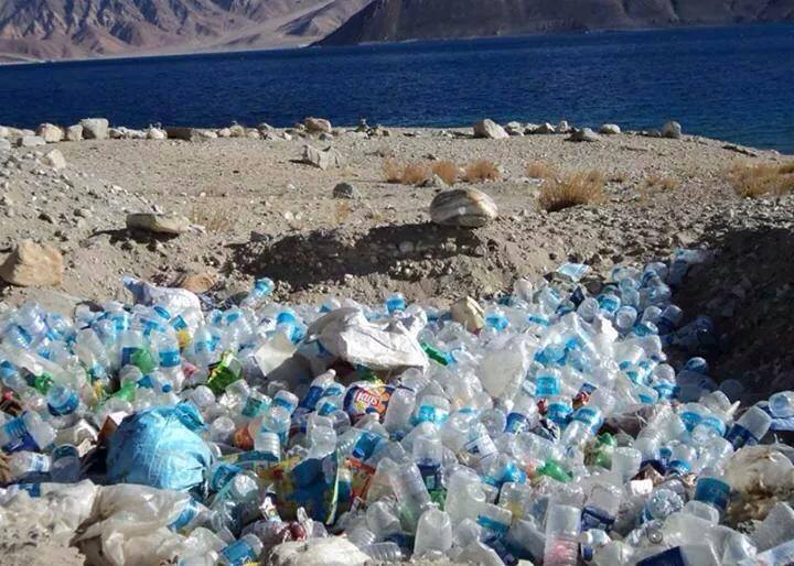 Plastic bottles strewn around near the Pangong Tso Lake. (Source: Facebook/Arch Riders)