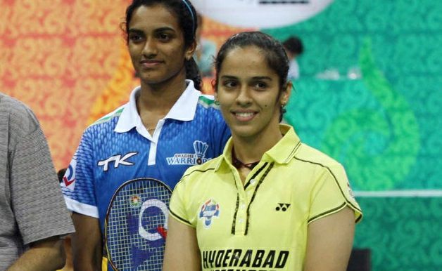 Saina Nehwal (in yellow) with PV Sindhu (Source: Facebook/Olympics India at Tokyo 2020)