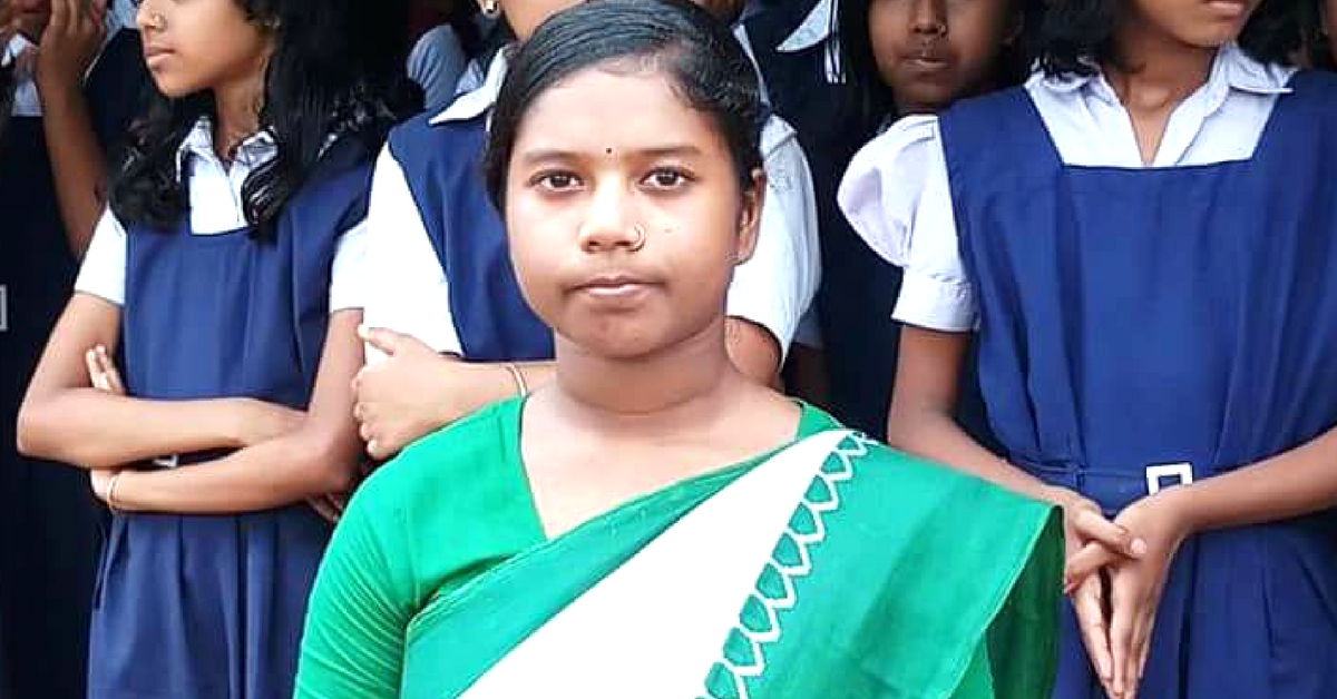 Rumpa, a student of a school in a village near Kolkata, jumped into a pond to save a 3 year old child. Image credit: Aritra Maity.