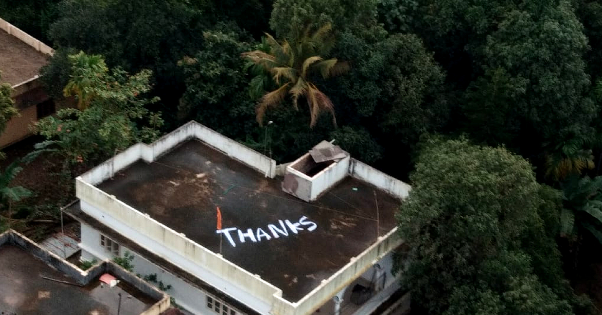 Saved thanks to Naval Commander Vijay Varma, the woman left a 'Thank You' note on her terrace in Kerala. Image Credit: <a href="https://twitter.com/indiannavy/status/1031395674330411008/photo/1?ref_src=twsrc%5Etfw%7Ctwcamp%5Etweetembed%7Ctwterm%5E1031395674330411008&amp;ref_url=https%3A%2F%2Fwww.thequint.com%2Fnews%2Findia%2Fnavy-greeted-with-thanks-note-on-kochi-rooftop-for-kerala-rescue">Spokesperson Navy</a>