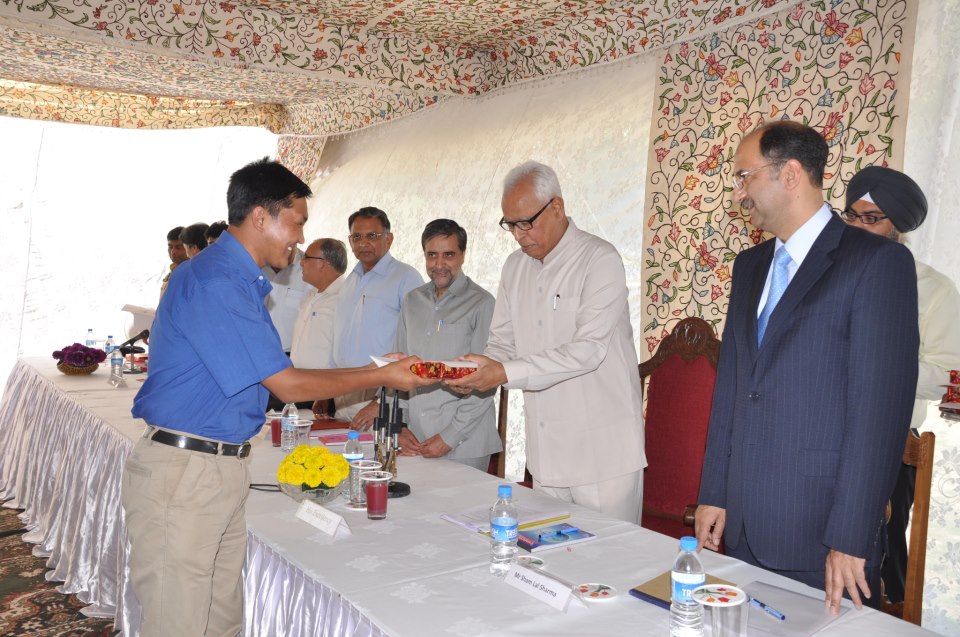 Sonam Lotus receiving a Letter of Appreciation from NN Vohra, the former Governor of J&K at Raj Bhavan, Srinagar in August 2012. (Source: Facebook/Sonam Lotus)