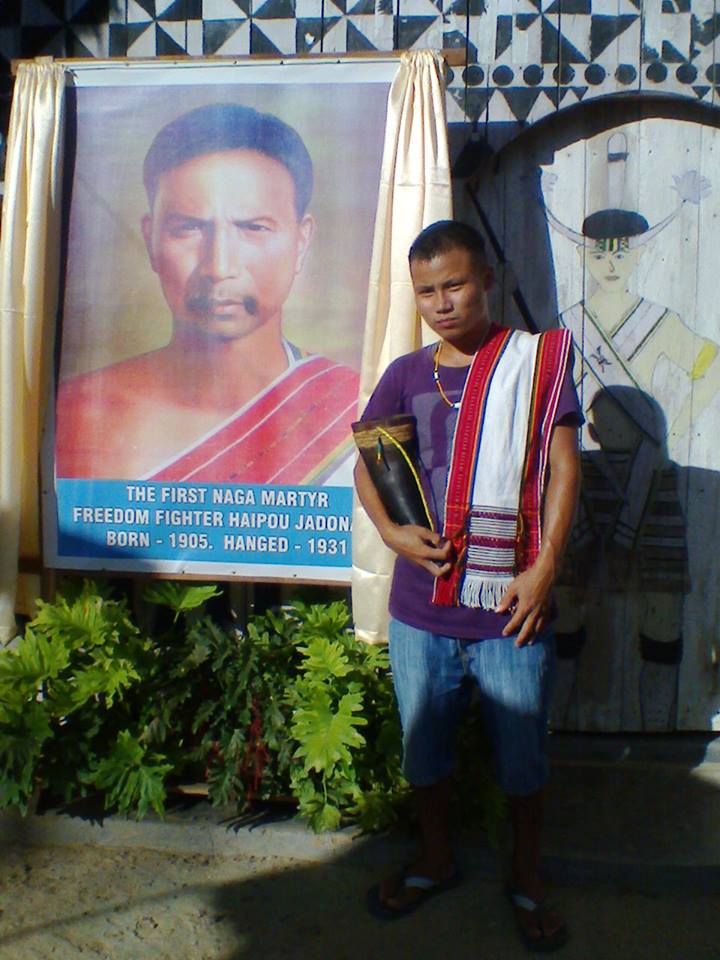 Standing next to a portrait of Haipou Jaidonang (Source: Chai'z Zeliangrong)