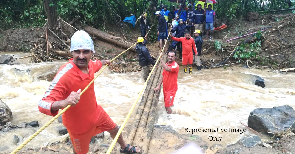 #KodaguFloods: Watch NDRF Officer Risk Life to Save Toddler in Nerve-Wracking Rescue!