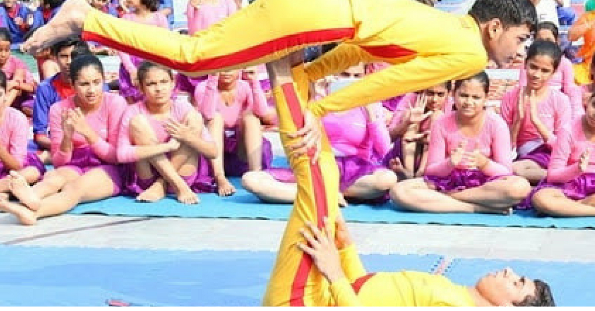 The group practices at an NGO in Delhi. Image Credits: Yoga Artists