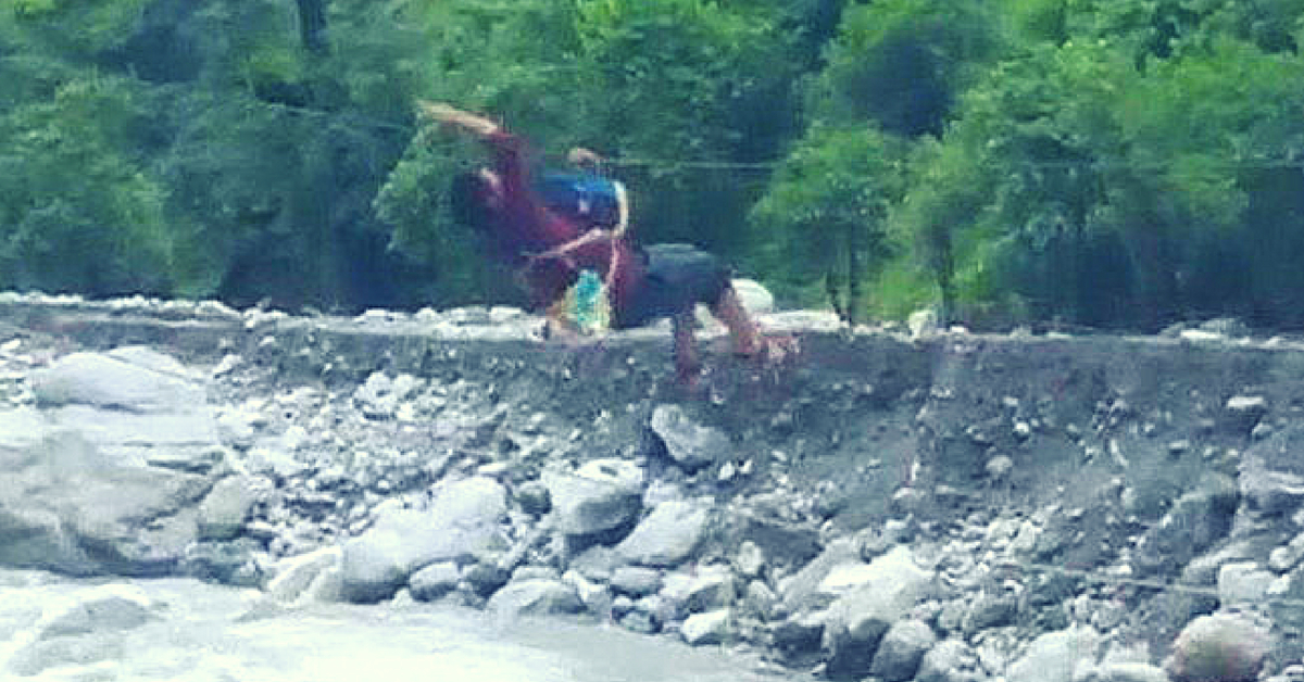 Jodh Singh rappling on a zip-line. (Source: Video still from YouTube)