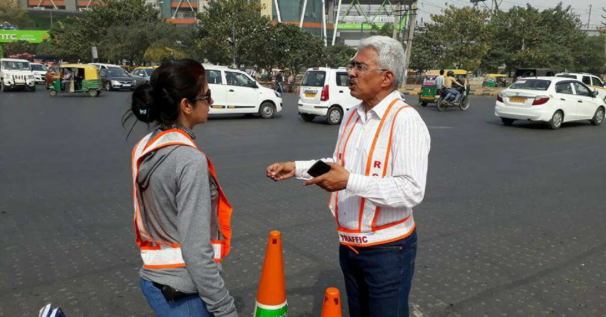 Here’s Why This 57-YO Businessman Directs Traffic in Gurugram’s Choked Streets