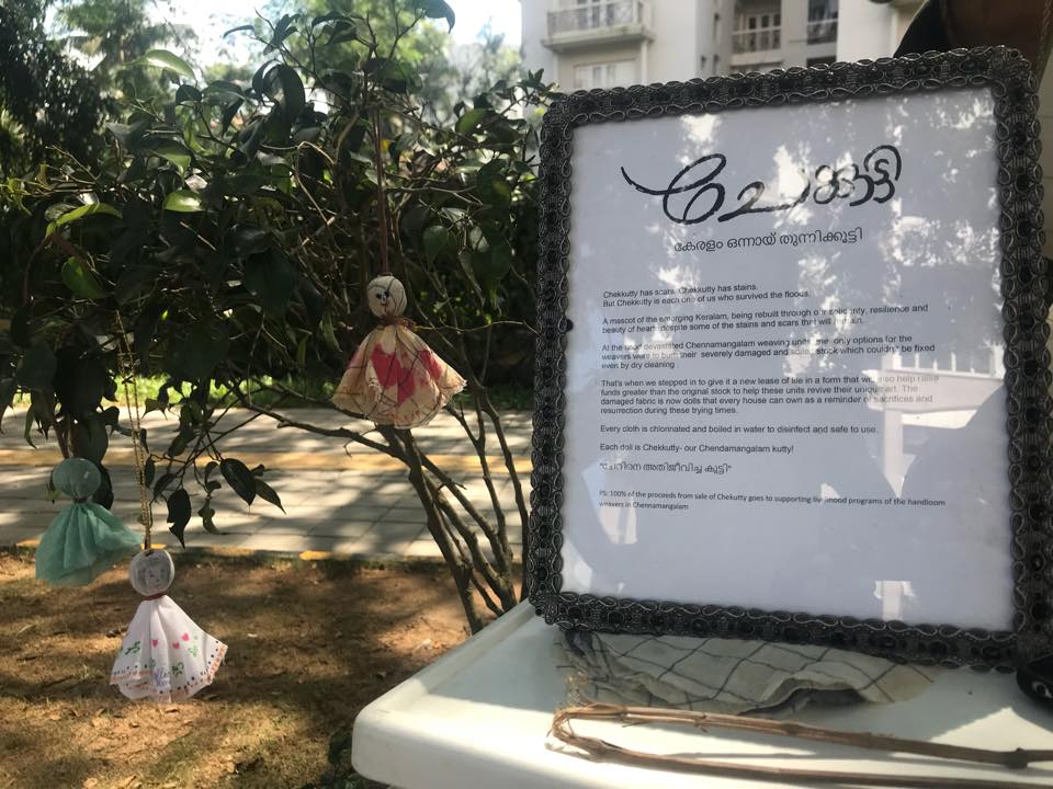 Chekutty doll and a plaque stating the objectives of this initiative. (Source: Facebook/Chekutty)