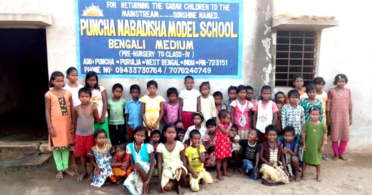 The students of the Puncha Nabadisha Model School, West Bengal patronised by a Kolkata traffic cop. Image Credit:<a href="https://indianexpress.com/article/india/in-purulia-kolkata-constable-runs-residential-school-for-tribal-children-5034044/"> Pandui Manab Kallayan Samiti</a>