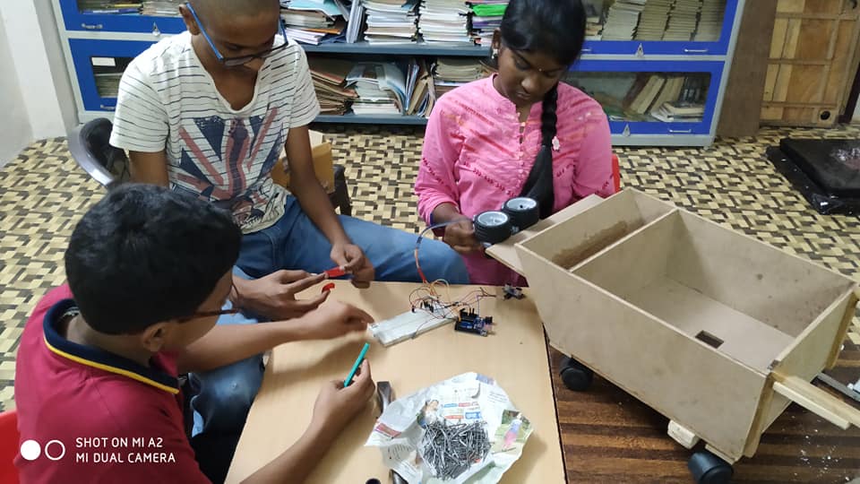 Students working on the Pothole Warrior design. (Source: The Crossword School)