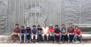 Meet The Art Professor & His Students Carving Some 'Peace' In A Kerala Town