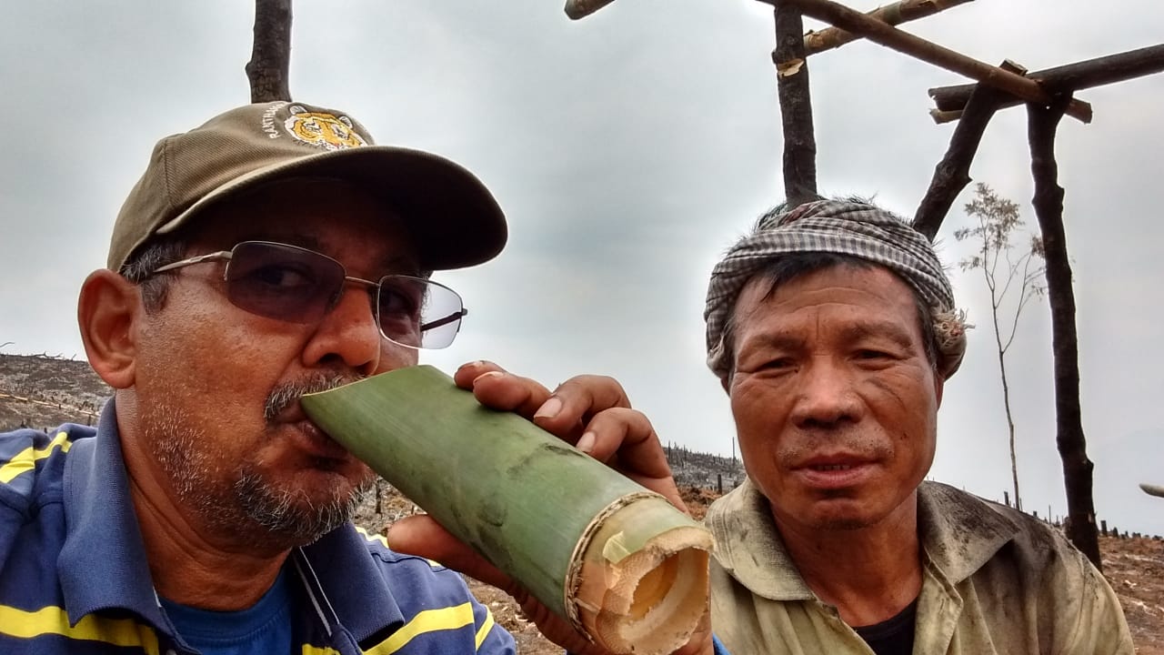 Understanding jhum cultivation. Enjoying a mug of local red tea with a jhum farmer in 2017. 