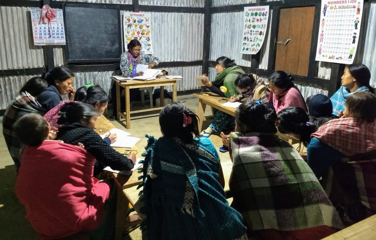 Usha taking evening literacy classes for women at the renovated nursery school building-solar lighting-in November 2018. 