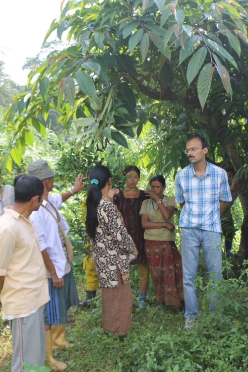 Sandeep Tambe with locals in Sikkim, helping them understand the value of these forests. 